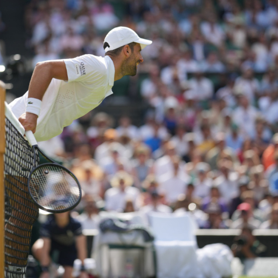 Djokovic battles past tough Frenchman to equal Federer; "A little bit lucky, a little bit skillful"